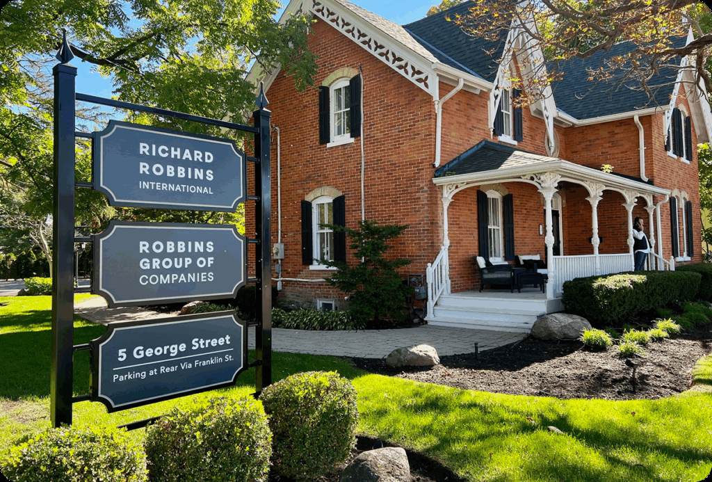Historic brick building with Richard Robbins International signage at 5 George Street